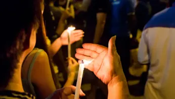 Hundreds Attend Vigil After Car Smashes Into Tampa Gay Club, Killing Four and Injuring 13